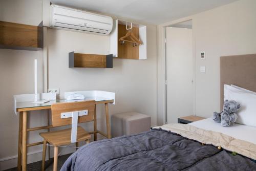 Habitación Triple del hotel D'espagne. Foto 2
