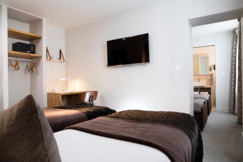 Habitación Triple del hotel D'espagne. Foto 3