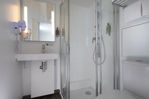 Habitación Triple del hotel D'espagne. Foto 5