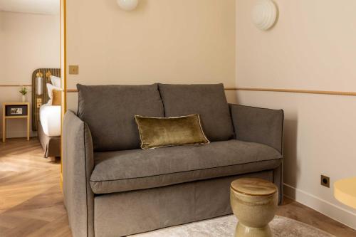 Habitación Triple Deluxe del hotel D'espagne. Foto 6