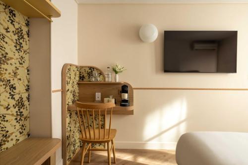 Habitación Triple Deluxe del hotel D'espagne. Foto 7