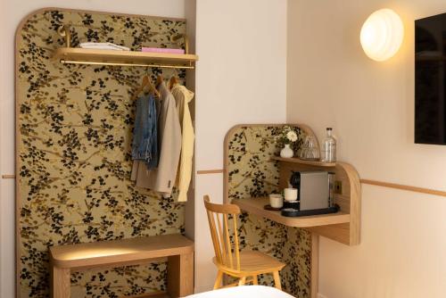 Habitación Triple Deluxe del hotel D'espagne. Foto 8