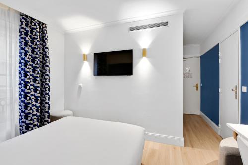Habitación Doble Superior del hotel Elysées Opéra. Foto 10