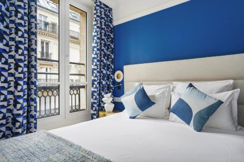 Habitación Doble Premium del hotel Elysées Opéra. Foto 25