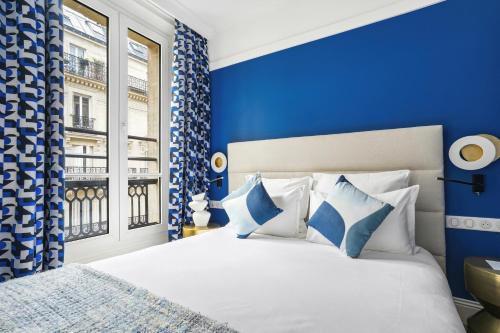 Habitación Doble Premium del hotel Elysées Opéra. Foto 30