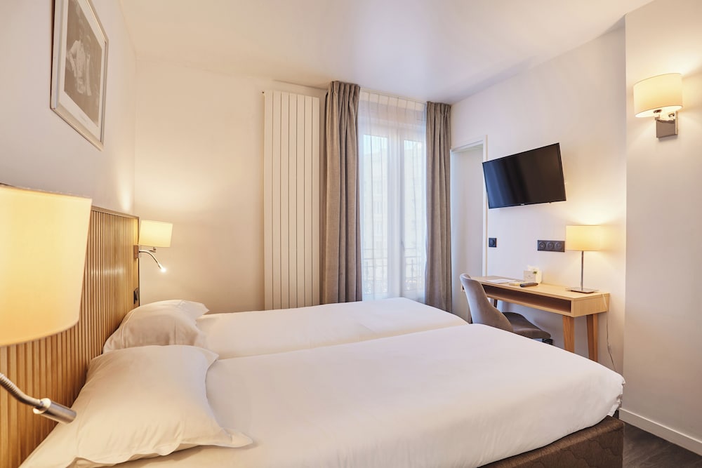 Habitación estándar con 2 camas individuales del hotel Gabriel Issy