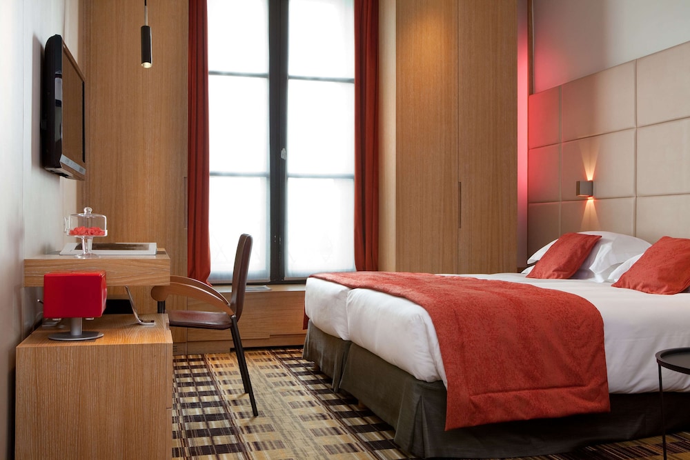 Habitación Deluxe con 1 cama doble o 2 individuales del hotel GOLDEN TULIP DE NOAILLES