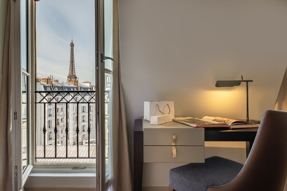 Habitación con vista a la Torre Eiffel del hotel Le Walt. Foto 6