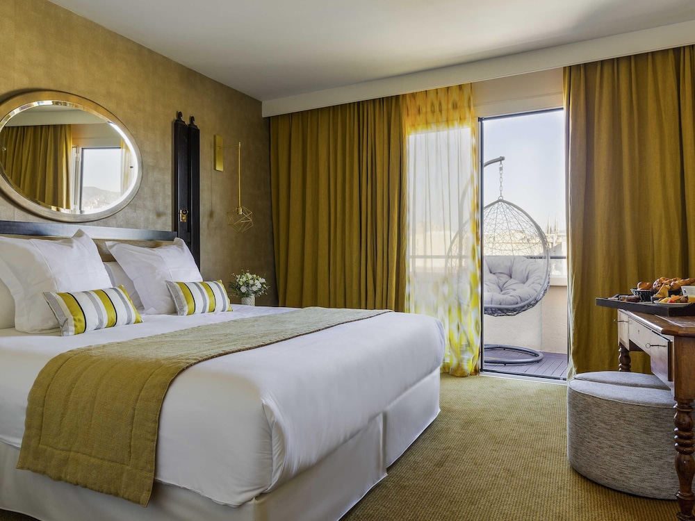 SUITE CON TERRAZA, 1 Cama King Size, vistas panorámicas al Vieux - Port del hotel Grand Beauvau Marseille Vieux-port – Mgallery. Foto 3