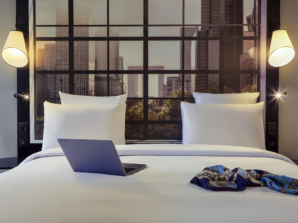 Habitación Clásica con 1 cama doble y 1 cama individual del hotel Mercure Paris La Defense Grande Arche