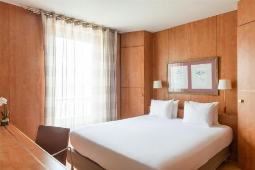 Habitación Doble Estándar del hotel Best Western Ronceray Opera. Foto 1