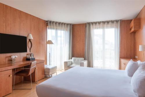 Habitación Deluxe con cama extragrande del hotel Best Western Ronceray Opera. Foto 1