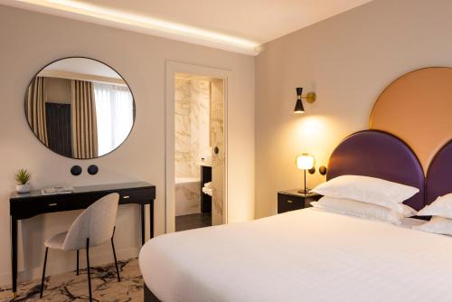 2 Chambres Communicantes del hotel Mondial. Foto 1