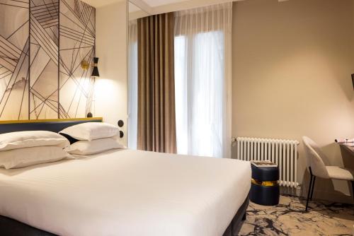 Habitación Doble Deluxe del hotel Mondial. Foto 7