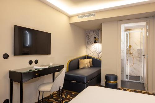 Habitación Triple Deluxe del hotel Mondial. Foto 5