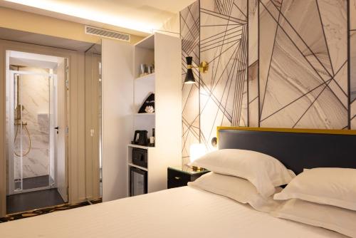 Habitación Triple Deluxe del hotel Mondial. Foto 9