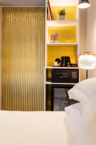 Habitación Triple Deluxe del hotel Mondial. Foto 13