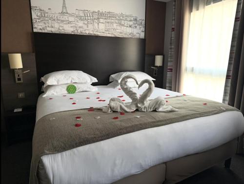 Habitación Premium con cama extragrande del hotel Holiday Inn Paris Montmartre
