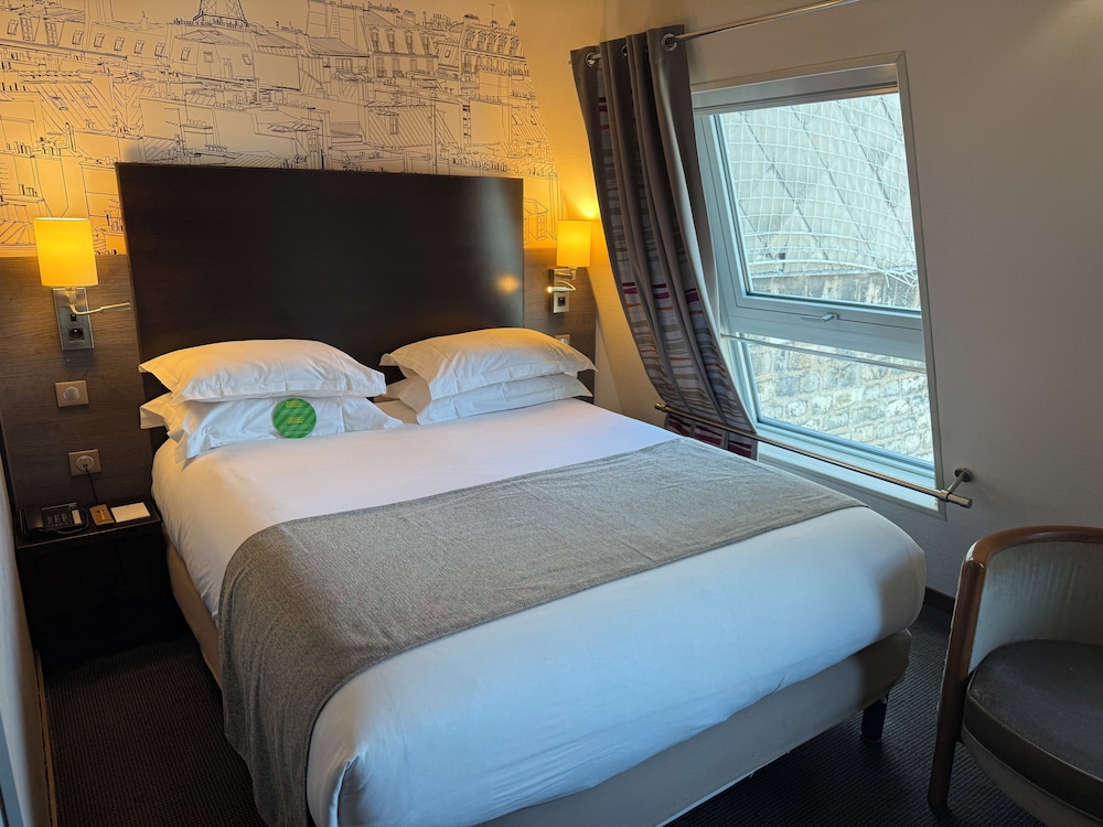 Habitación Premium, 1 cama de matrimonio grande del hotel Holiday Inn Paris Montmartre. Foto 14