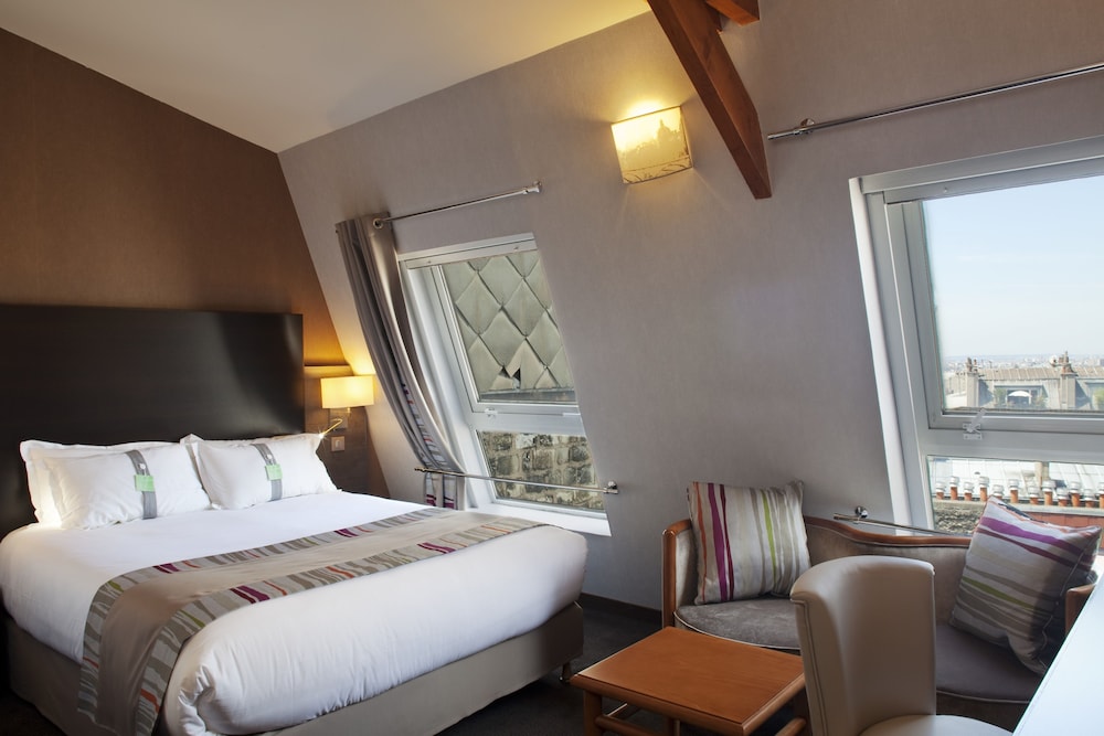 Habitación estándar, 1 cama de matrimonio del hotel Holiday Inn Paris Montmartre. Foto 4