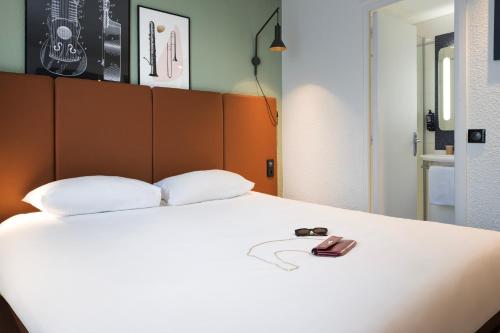 Habitación Doble Estándar del hotel IBIS PARIS GARE DU NORD TGV. Foto 4