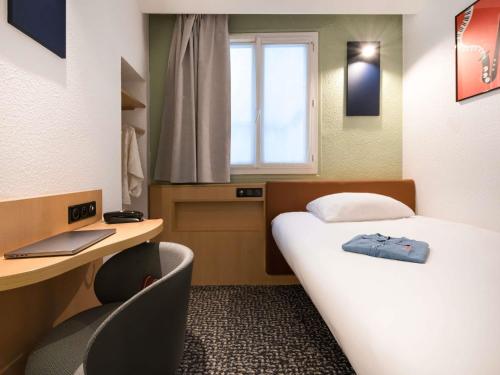 Habitación Estándar con cama individual del hotel IBIS PARIS GARE DU NORD TGV. Foto 2