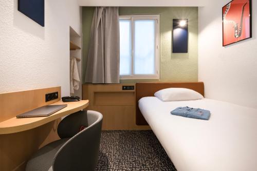 Habitación Estándar con cama individual del hotel IBIS PARIS GARE DU NORD TGV. Foto 5