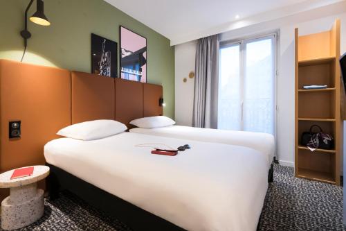Habitación Estándar - 2 camas individuales del hotel IBIS PARIS GARE DU NORD TGV. Foto 2