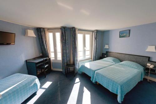 Habitación Triple del hotel Royal Bergere. Foto 1