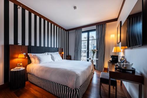 Habitación Doble Superior del hotel Grand Champs-Élysées. Foto 1