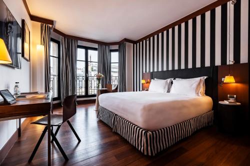 Chambre Prestige - Arc De Triomphe del hotel Grand Champs-Élysées. Foto 7