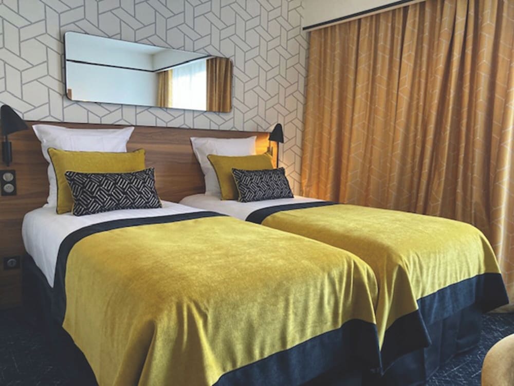 Habitación Doble Comfort del hotel Vacances Bleues Villa Modigliani. Foto 10