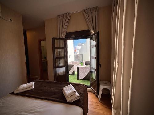 Habitación Doble con terraza - 2 camas del hotel Plaza. Foto 9