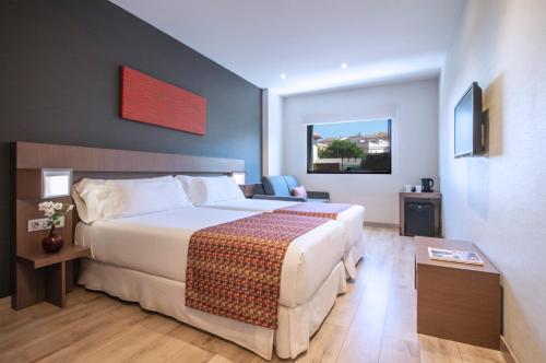 Habitación Triple del hotel Pierre & Vacances Granada. Foto 1