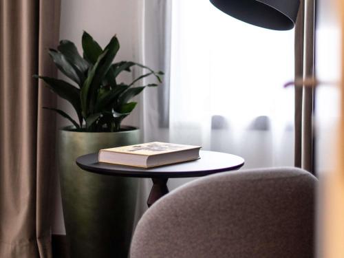 Homage Suite Marguerite Yourcenar with Garden View del hotel Le Louise Hotel Brussels - MGallery. Foto 3
