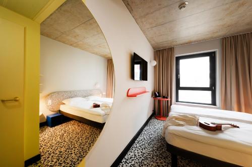 Habitación estándar con 1 cama doble 160x200 del hotel ibis budget Münster City. Foto 14