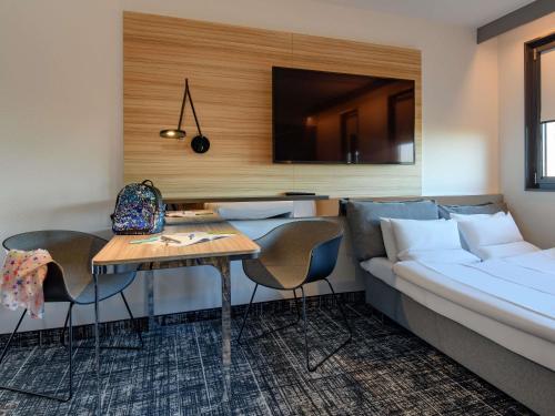 Suite Estándar con sofá cama - 2 camas individuales del hotel Novotel Suites Berlin City Potsdamer Platz. Foto 6