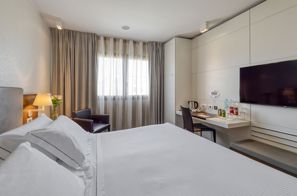 Habitación Superior del hotel H10 Roma Citta. Foto 6