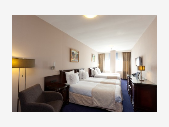 Habitación cuádruple del hotel Xo Hotels Blue Square. Foto 1