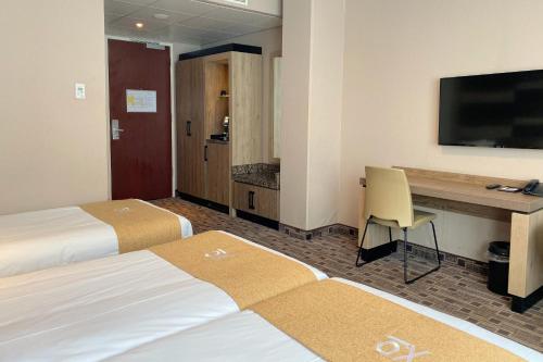 Habitación Triple del hotel Xo Hotels Blue Square