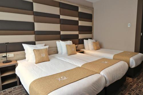 Habitación Triple del hotel Xo Hotels Blue Square. Foto 3