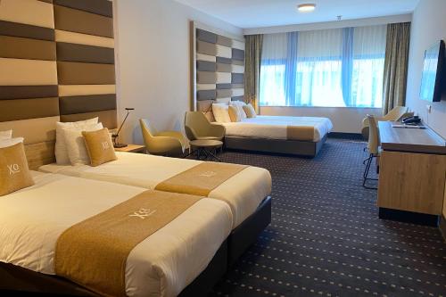 Habitación Cuádruple del hotel Xo Hotels Blue Square