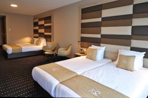 Habitación Cuádruple del hotel Xo Hotels Blue Square. Foto 3