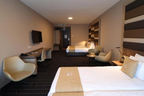 Habitación Cuádruple del hotel Xo Hotels Blue Square. Foto 4