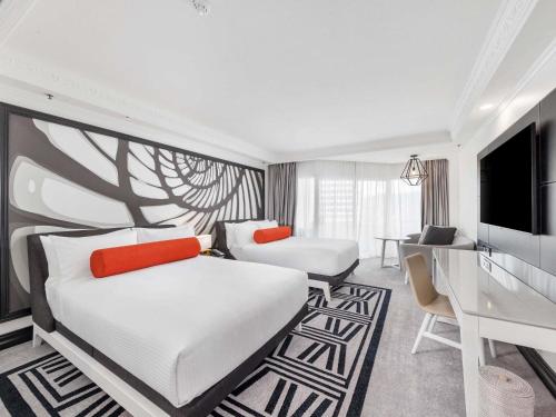 Habitación Grand Superior con Vista a la Ciudad y Montaña, Camas Twin del hotel Pullman Cairns International. Foto 1