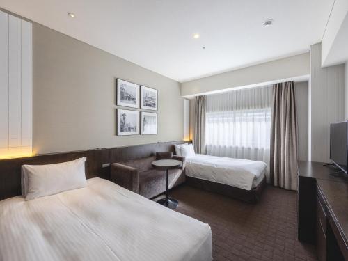 Habitación con 2 camas individuales - No fumadores - Última planta del hotel Gracery Ginza. Foto 5