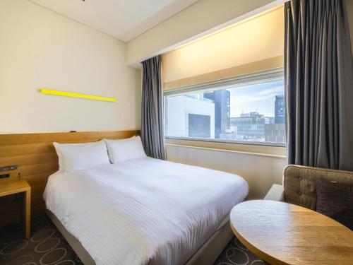 Habitación Doble en planta Executive - No fumadores del hotel Gracery Ginza. Foto 9