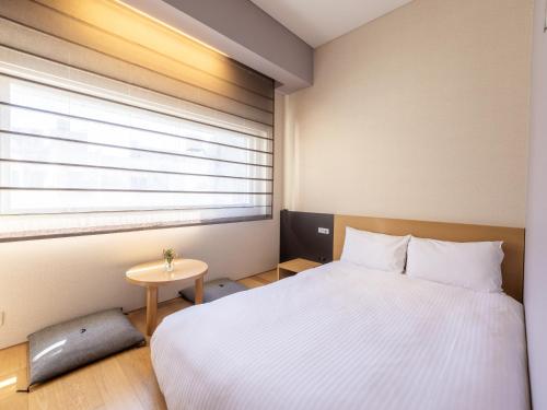 Habitación Individual Concept con suelo de madera - No fumadores del hotel Gracery Ginza. Foto 3