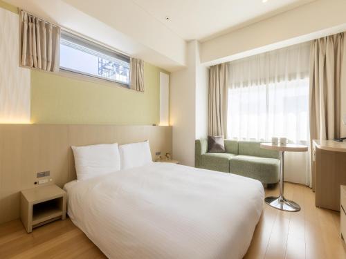 Habitación doble con suelo de madera - No fumadores (Servicios ReFa) del hotel Gracery Ginza. Foto 6