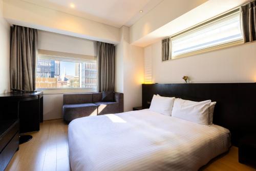 Habitación Doble Executive con suelo de madera - No fumadores del hotel Gracery Ginza. Foto 4